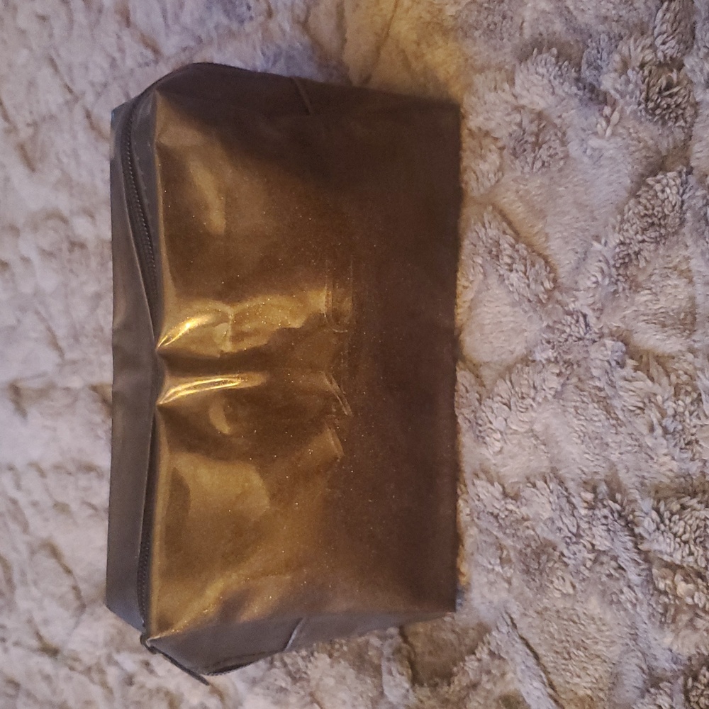 #6- MAC Shimmering  Makeup Bag